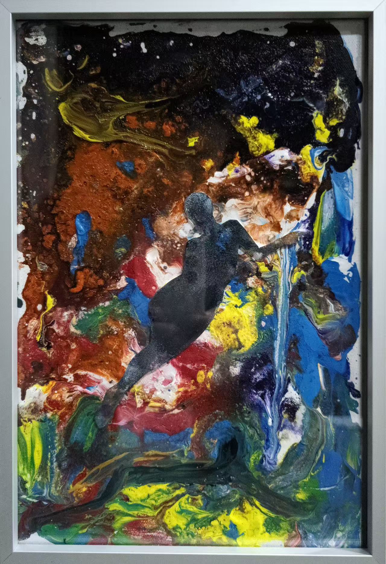 Mixed-media artwork: dark figure against vivid abstract colour