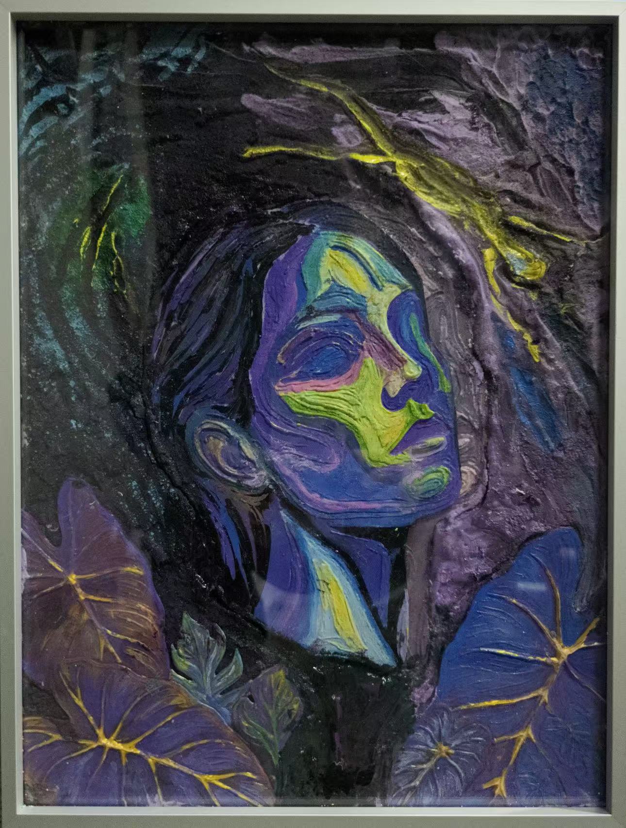 Mixed-media artwork: portrait among purple leaves